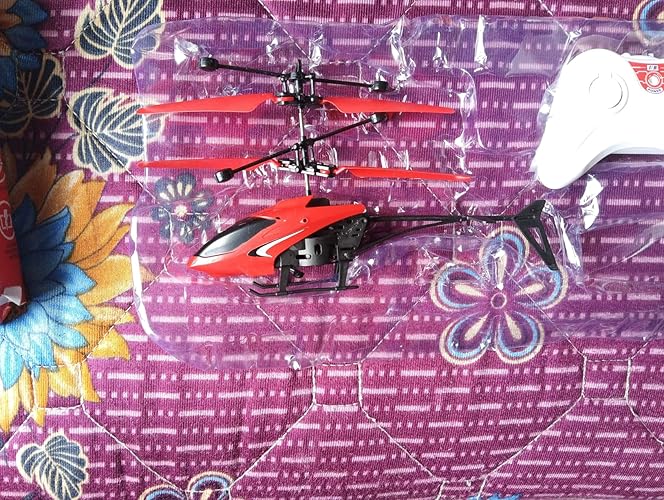 Buy RIYA TOYS STUDIO Mini Remote Control Helicopter with Gravity Sensor(Battery not Included), LED Lights & USB Chargeab
